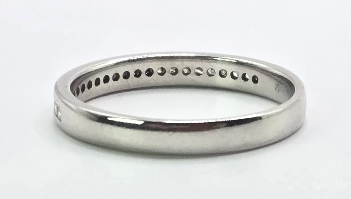 3164 Vintage: Platinum Princess Cut Diamond Half Eternity Ring