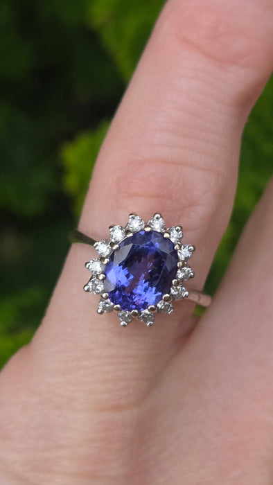 6500 Vintage: 18ct White Gold 2.06ct Tanzanite & Diamond Halo Cluster Ring