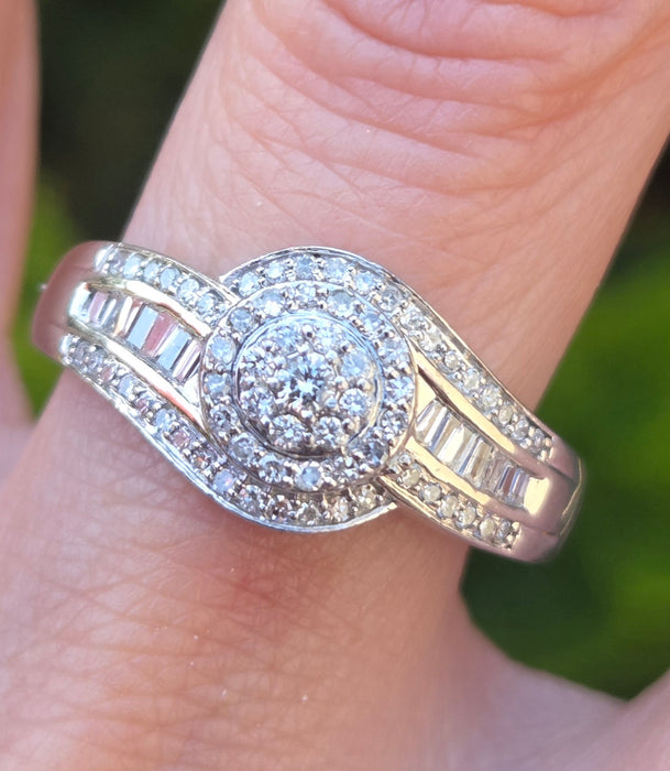 3162 Vintage: Platinum Diamond Round Cluster & Baguette Ring
