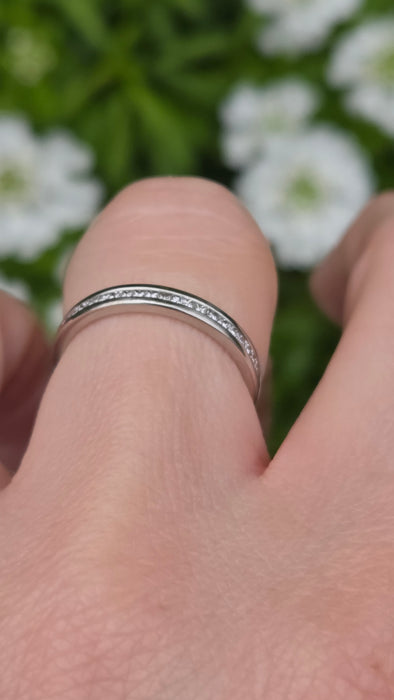 3164 Vintage: Platinum Princess Cut Diamond Half Eternity Ring