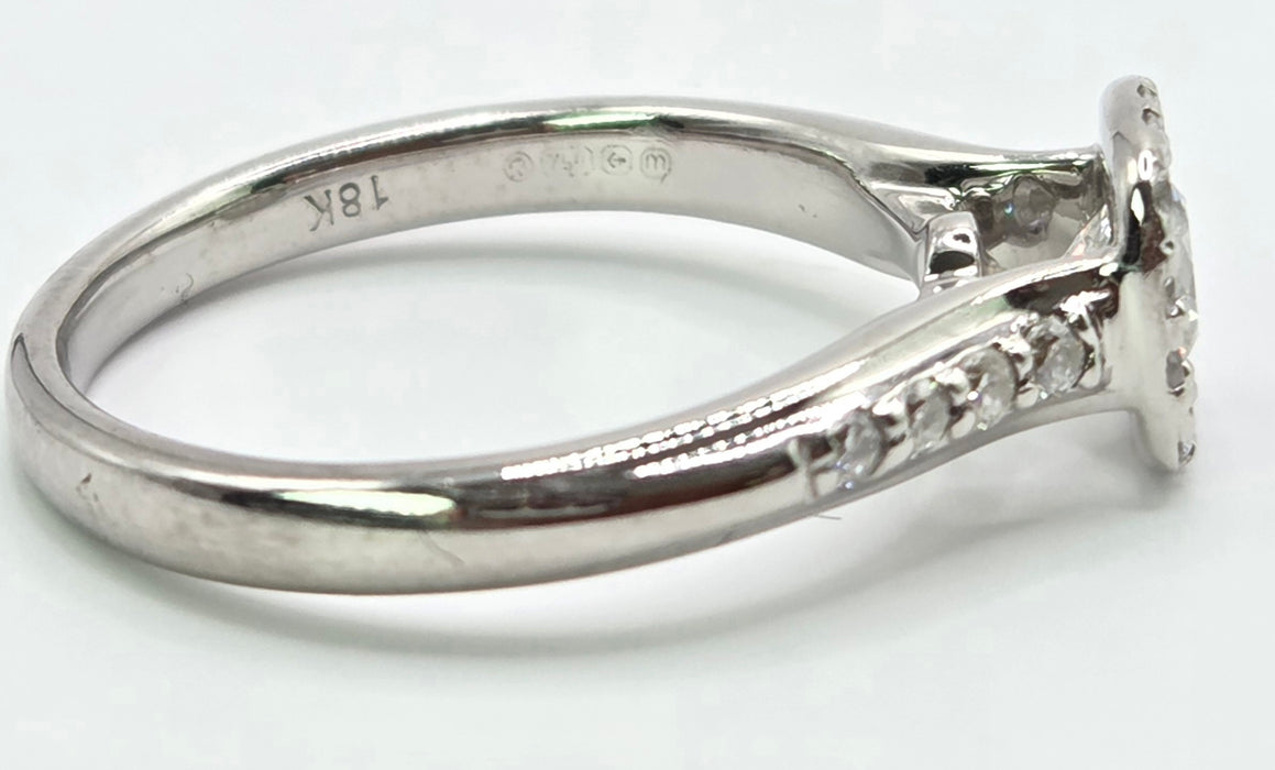 3176 Vintage: 18ct White Gold 0.55ct Natural Diamond Cushion Halo Ring — From 2011