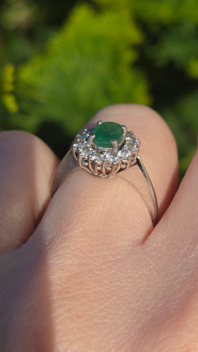 6512  Modern: 18ct White Gold Emerald & Diamond Oval Cluster Ring — From 2016