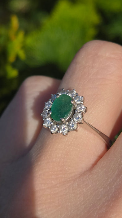 6512  Modern: 18ct White Gold Emerald & Diamond Oval Cluster Ring — From 2016