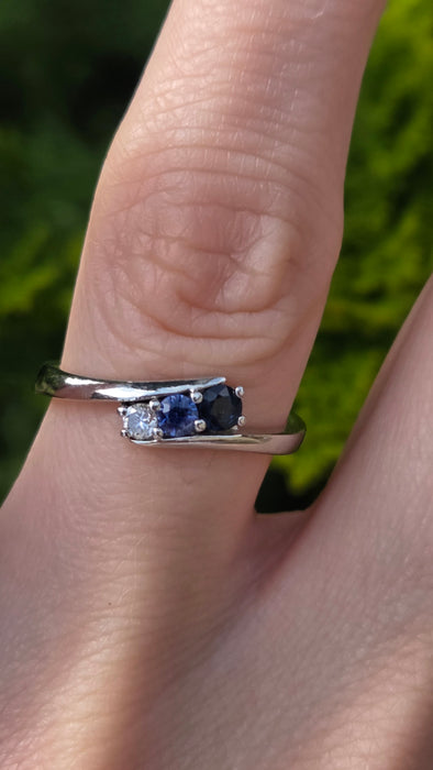3165 Vintage: Platinum Blue Sapphire & Diamond Three-Stone Crossover Ring