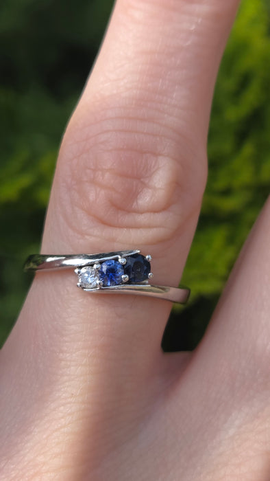 3165 Vintage: Platinum Blue Sapphire & Diamond Three-Stone Crossover Ring