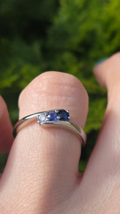 3165 Vintage: Platinum Blue Sapphire & Diamond Three-Stone Crossover Ring