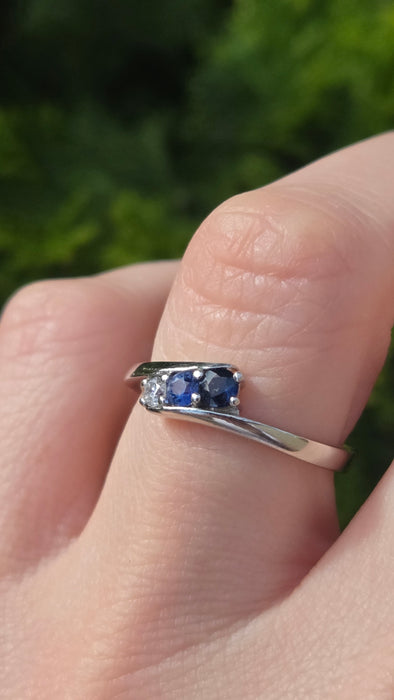 3165 Vintage: Platinum Blue Sapphire & Diamond Three-Stone Crossover Ring