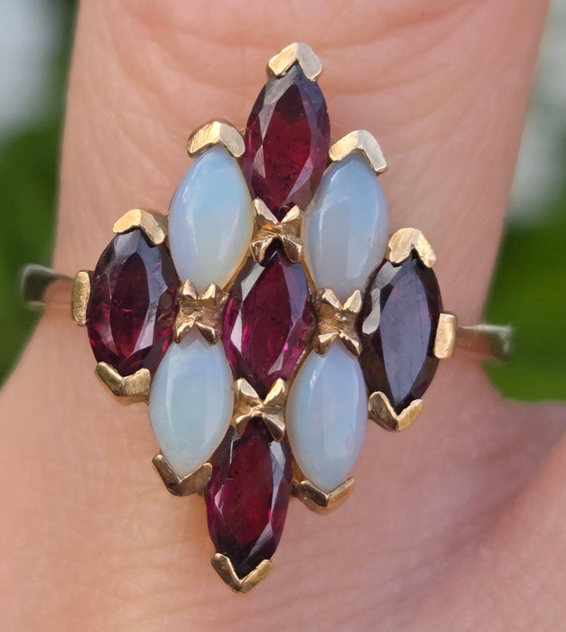 2152: Vintage: 9ct Gold Almandine Garnets White Opals Geometric Set Ring