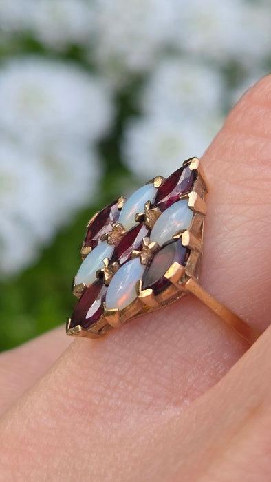 2152: Vintage: 9ct Gold Almandine Garnets White Opals Geometric Set Ring