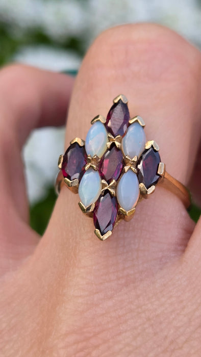 2152: Vintage: 9ct Gold Almandine Garnets White Opals Geometric Set Ring