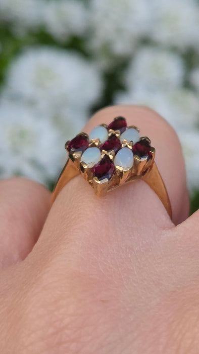 2152: Vintage: 9ct Gold Almandine Garnets White Opals Geometric Set Ring