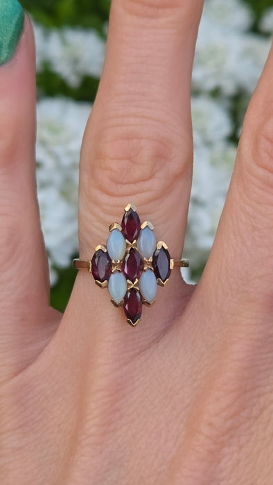 2152: Vintage: 9ct Gold Almandine Garnets White Opals Geometric Set Ring
