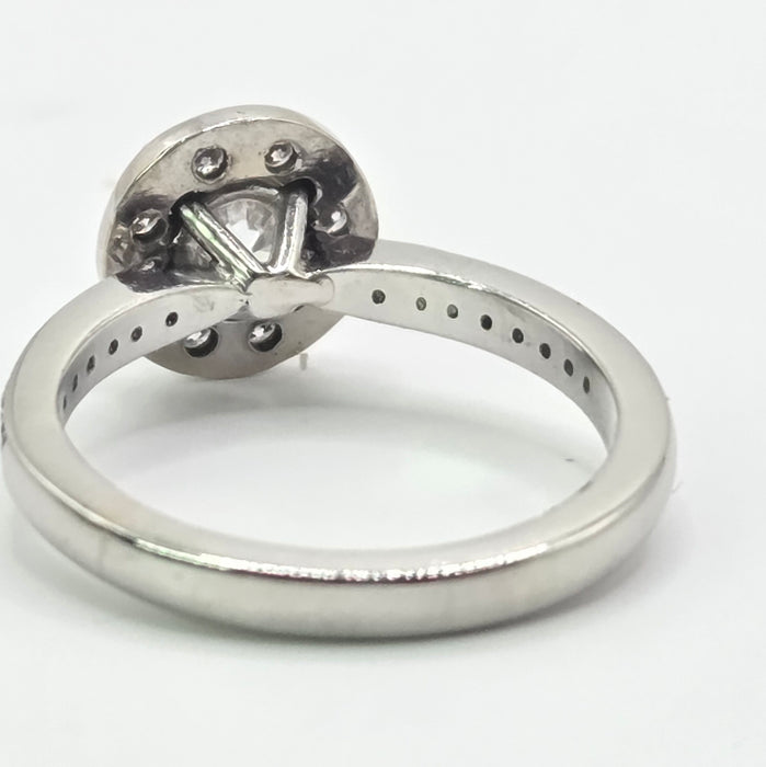 Modern: Platinum Diamond Solitaire (0.70ct) & Halo Cluster Ring — 1.59ct