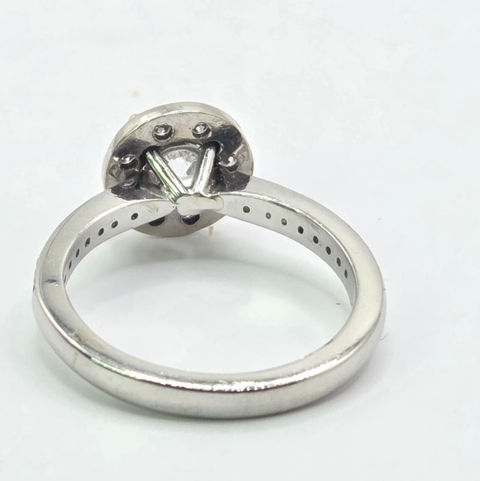 Modern: Platinum Diamond Solitaire (0.70ct) & Halo Cluster Ring — 1.59ct