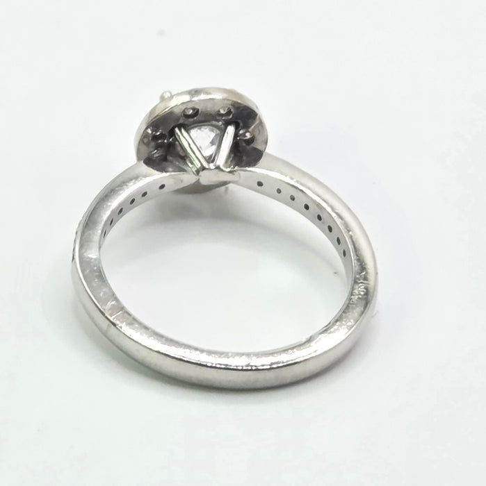Modern: Platinum Diamond Solitaire (0.70ct) & Halo Cluster Ring — 1.59ct
