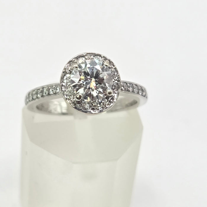 Modern: Platinum Diamond Solitaire (0.70ct) & Halo Cluster Ring — 1.59ct