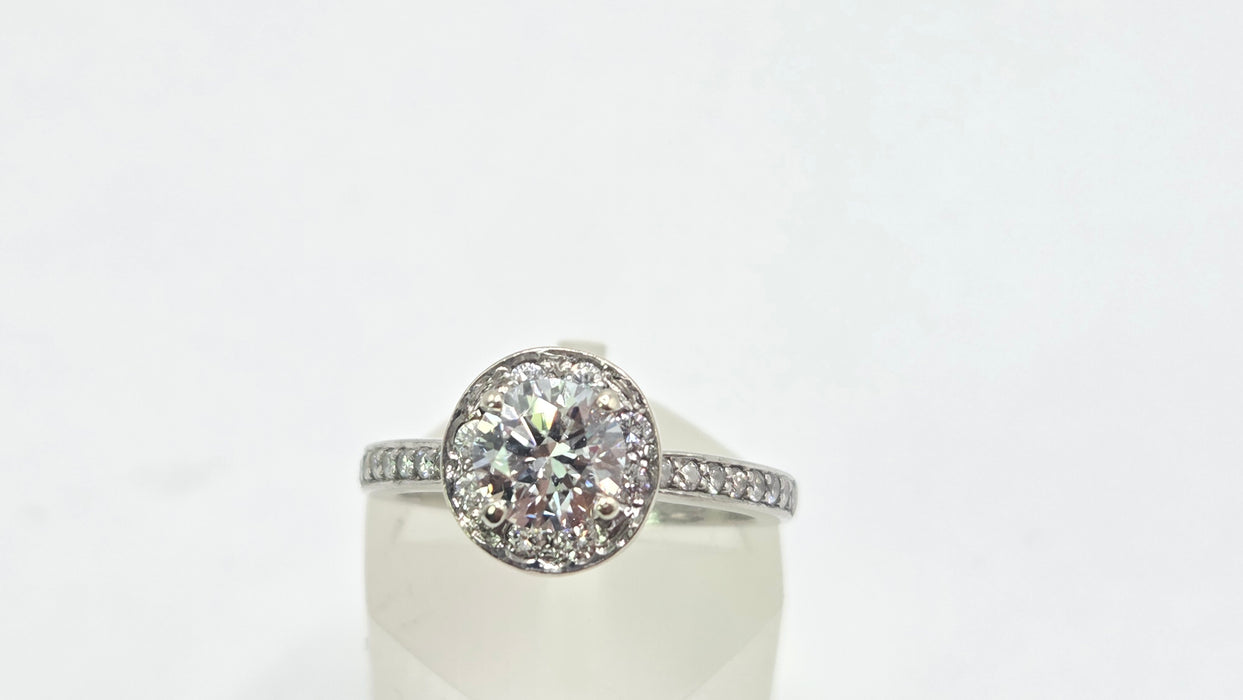 Modern: Platinum Diamond Solitaire (0.70ct) & Halo Cluster Ring — 1.59ct