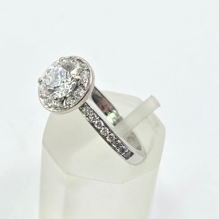 Modern: Platinum Diamond Solitaire (0.70ct) & Halo Cluster Ring — 1.59ct