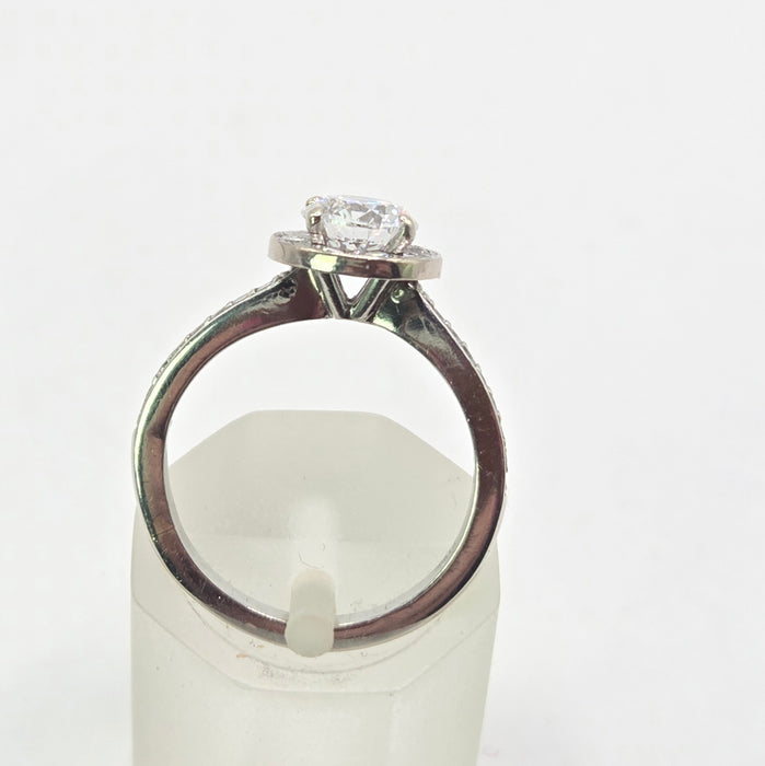 Modern: Platinum Diamond Solitaire (0.70ct) & Halo Cluster Ring — 1.59ct