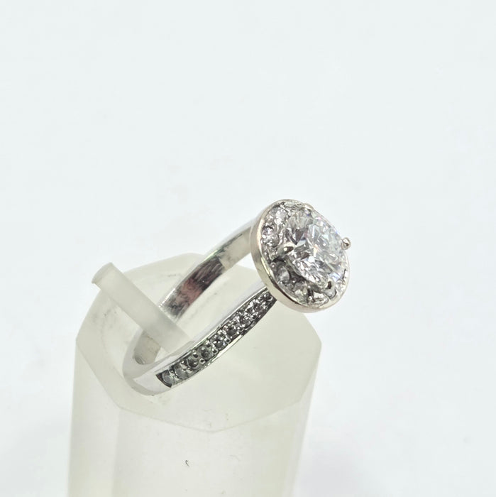 Modern: Platinum Diamond Solitaire (0.70ct) & Halo Cluster Ring — 1.59ct