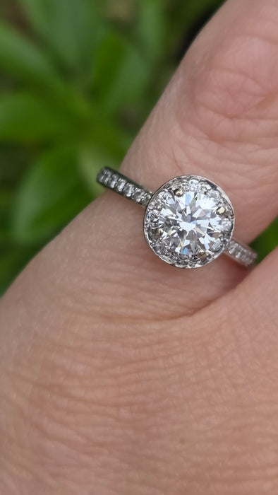 Modern: Platinum Diamond Solitaire (0.70ct) & Halo Cluster Ring — 1.59ct