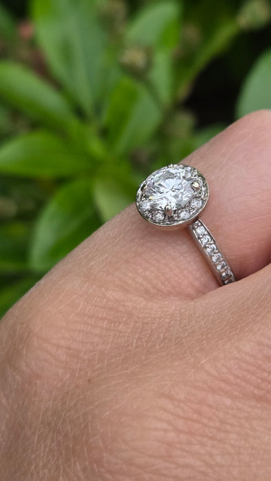 Modern: Platinum Diamond Solitaire (0.70ct) & Halo Cluster Ring — 1.59ct