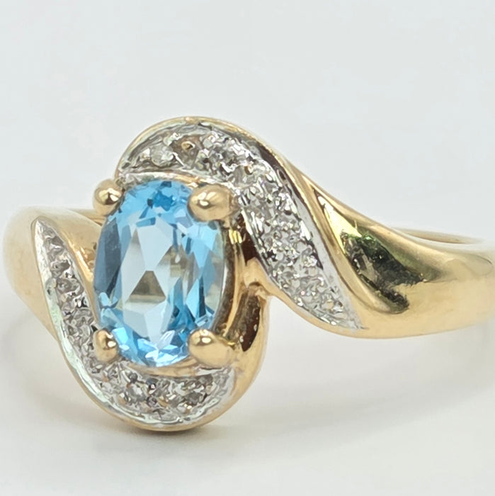 Vintage: 9ct Gold Blue Topaz & Diamond Crossover Ring