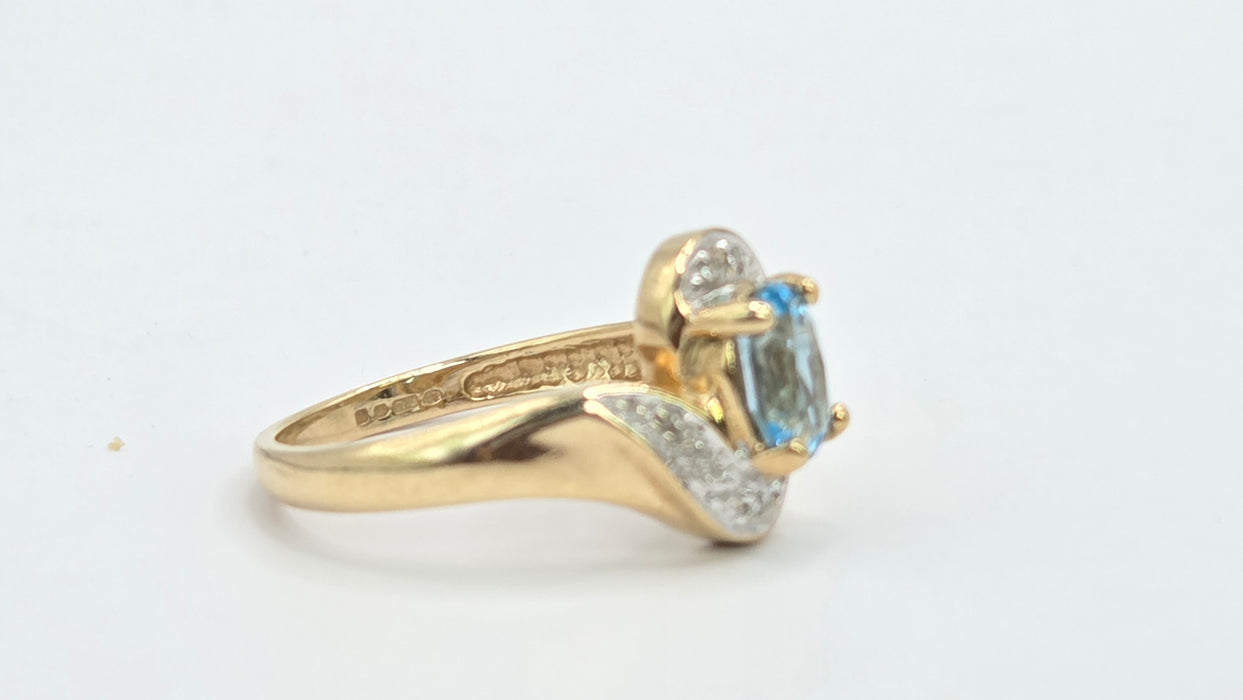 Vintage: 9ct Gold Blue Topaz & Diamond Crossover Ring