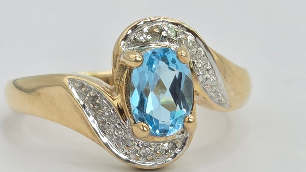 Vintage: 9ct Gold Blue Topaz & Diamond Crossover Ring