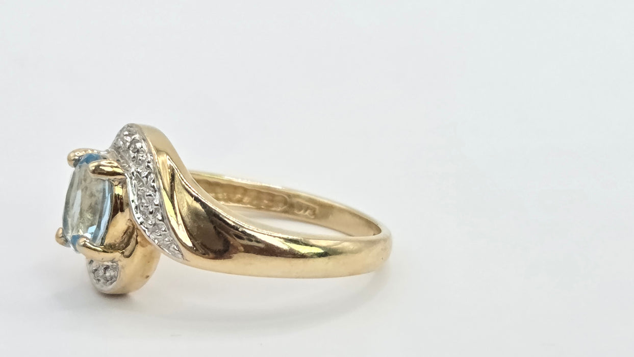 Vintage: 9ct Gold Blue Topaz & Diamond Crossover Ring
