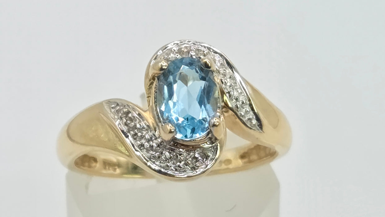 Vintage: 9ct Gold Blue Topaz & Diamond Crossover Ring