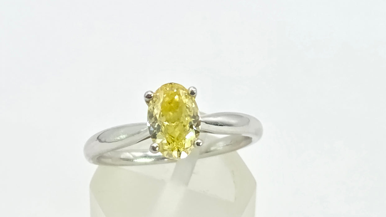 Modern: Platinum Fancy Yellow Diamond Solitaire Ring — 1.24ct