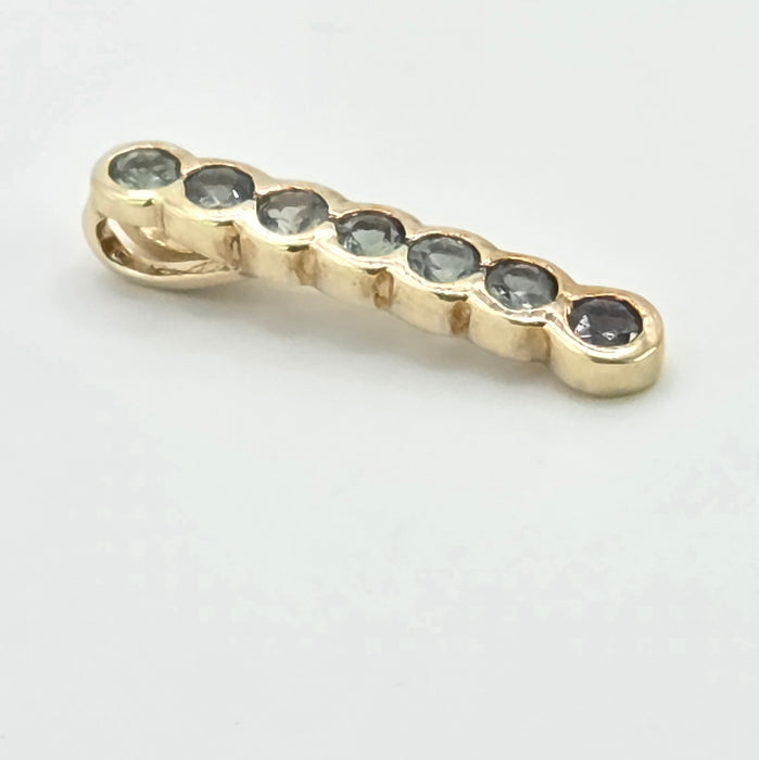 Vintage: 9ct Yellow Gold Blue Topaz Seven Stone Bar Pendant