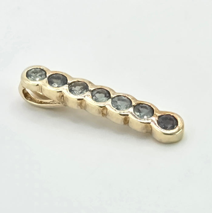 Vintage: 9ct Yellow Gold Blue Topaz Seven Stone Bar Pendant