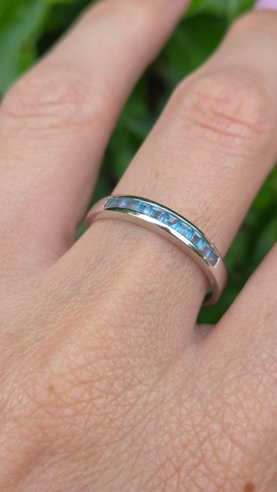 Vintage: 9ct White Gold Blue Topaz Channel Set Half Eternity Ring