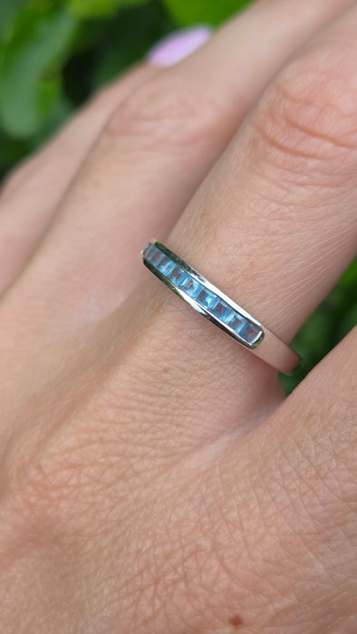 Vintage: 9ct White Gold Blue Topaz Channel Set Half Eternity Ring