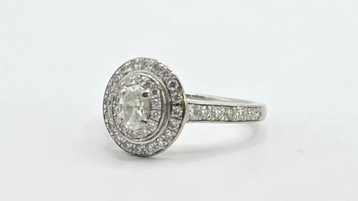 Vintage: 18ct White Gold Diamond 0.70ct Oval Halo Cluster Ring by Jenny Packham