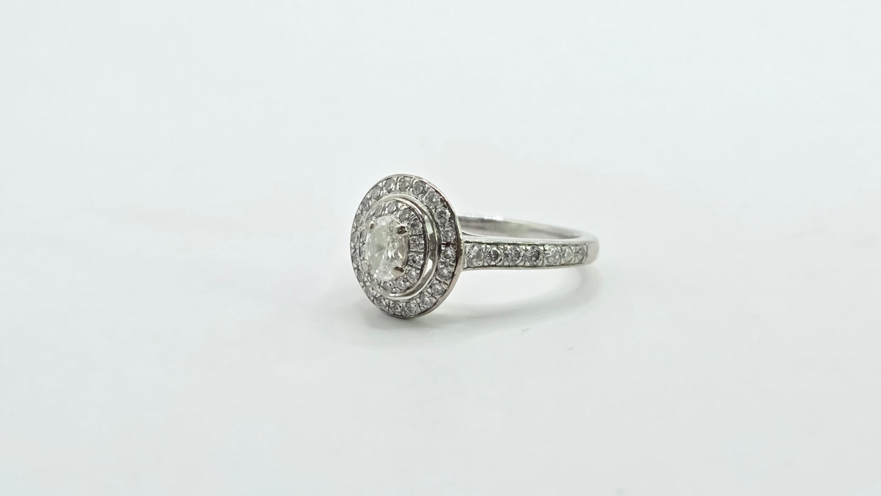 Vintage: 18ct White Gold Diamond 0.70ct Oval Halo Cluster Ring by Jenny Packham