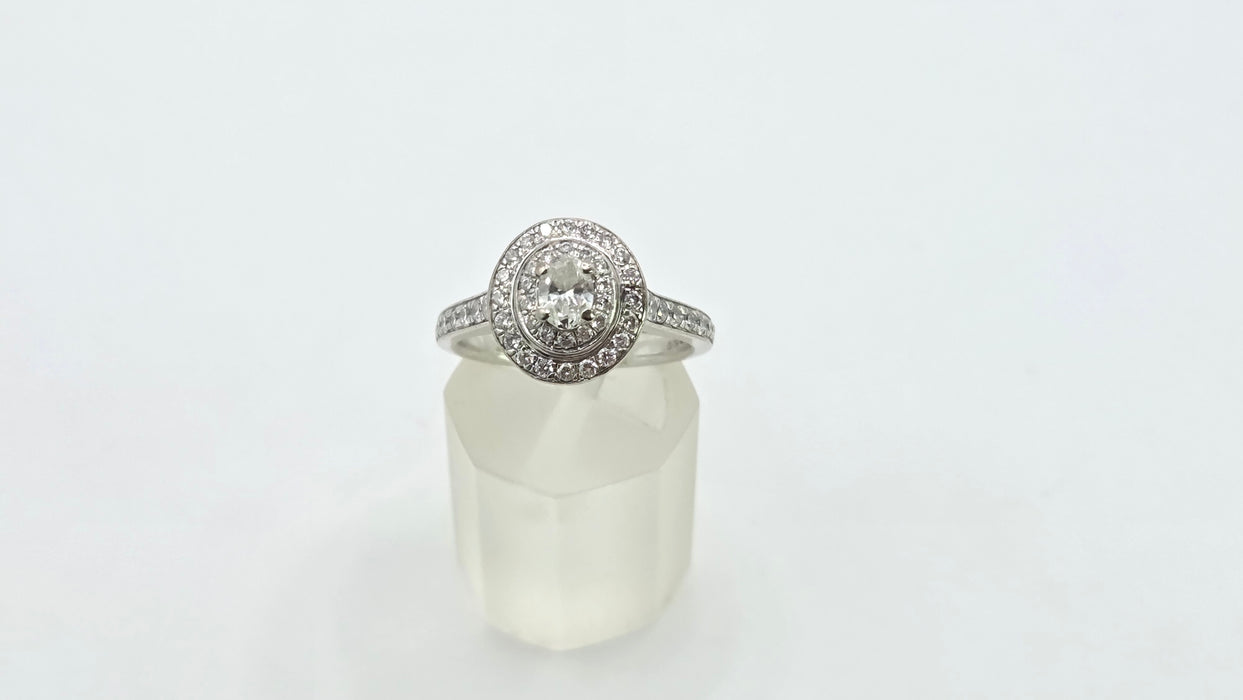 Vintage: 18ct White Gold Diamond 0.70ct Oval Halo Cluster Ring by Jenny Packham