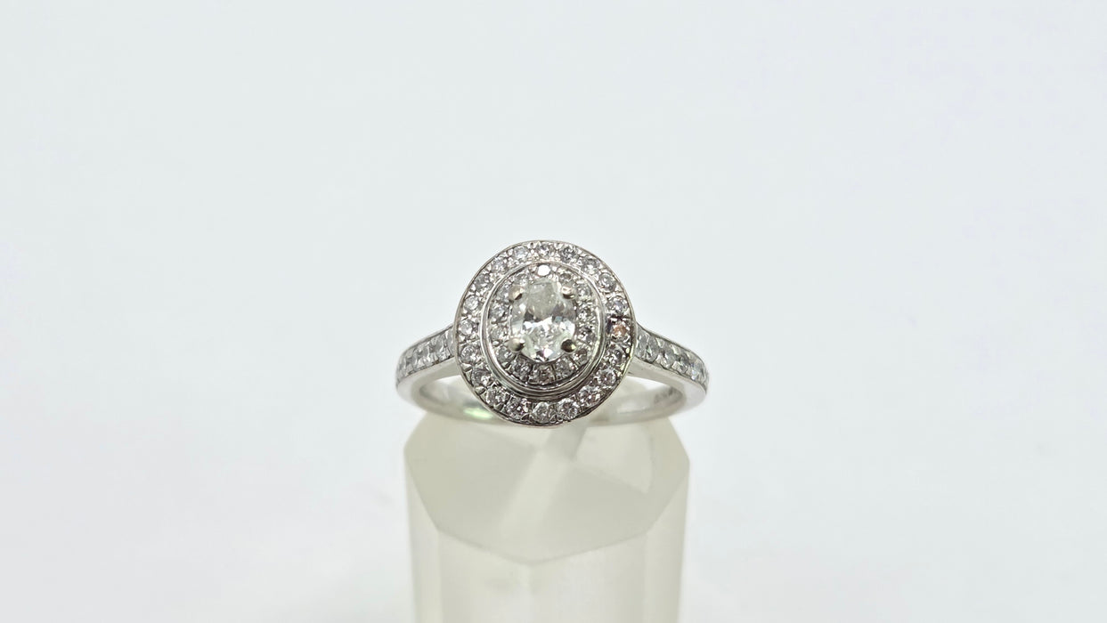 Vintage: 18ct White Gold Diamond 0.70ct Oval Halo Cluster Ring by Jenny Packham