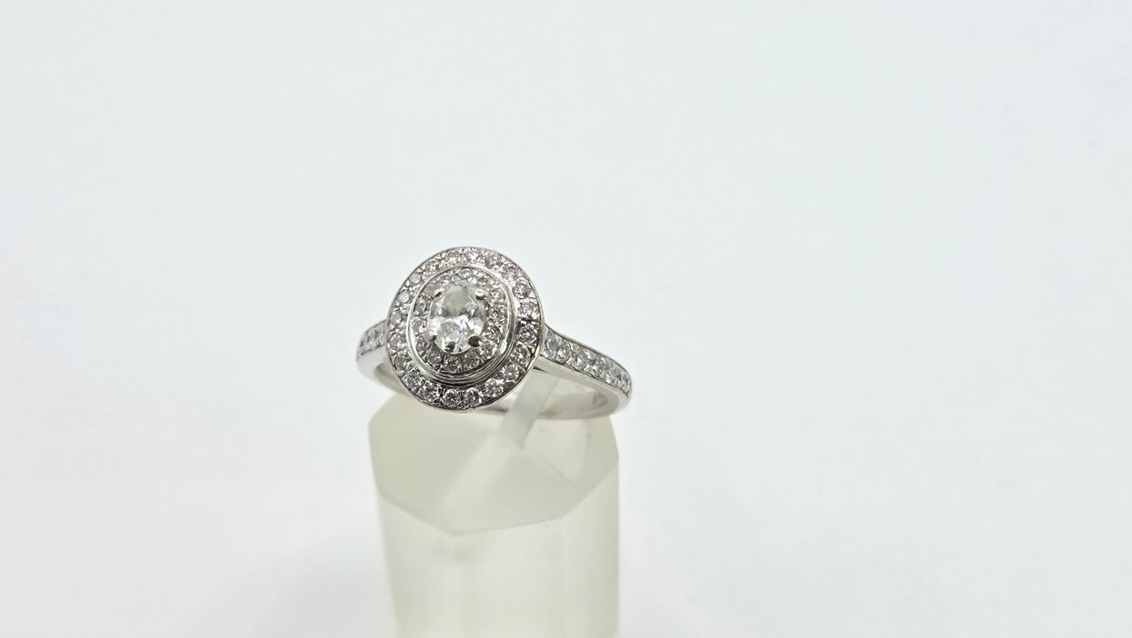 Vintage: 18ct White Gold Diamond 0.70ct Oval Halo Cluster Ring by Jenny Packham