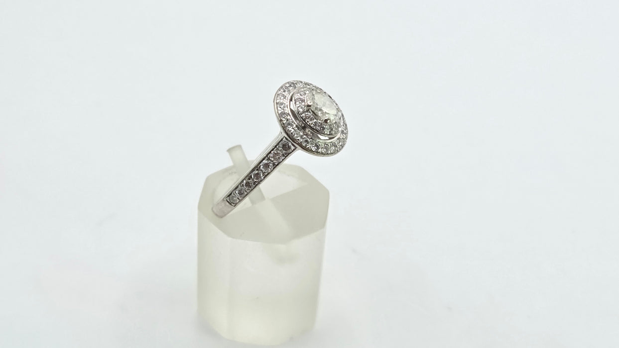 Vintage: 18ct White Gold Diamond 0.70ct Oval Halo Cluster Ring by Jenny Packham
