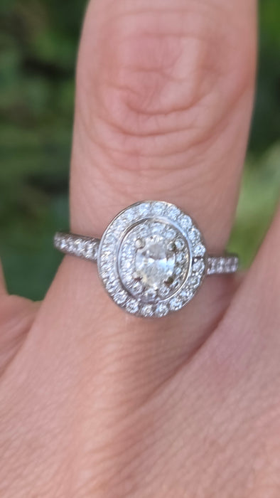 Vintage: 18ct White Gold Diamond 0.70ct Oval Halo Cluster Ring by Jenny Packham