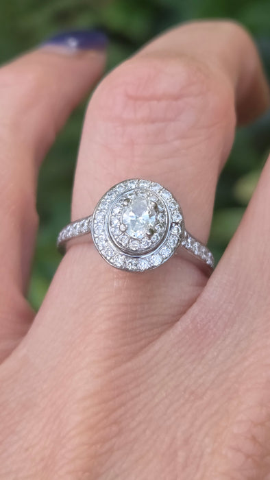 Vintage: 18ct White Gold Diamond 0.70ct Oval Halo Cluster Ring by Jenny Packham