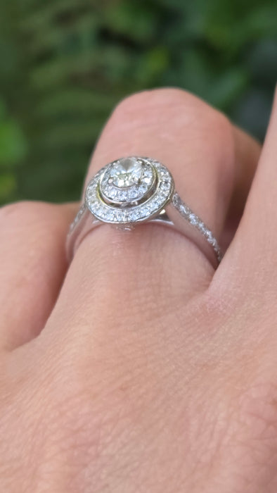 Vintage: 18ct White Gold Diamond 0.70ct Oval Halo Cluster Ring by Jenny Packham