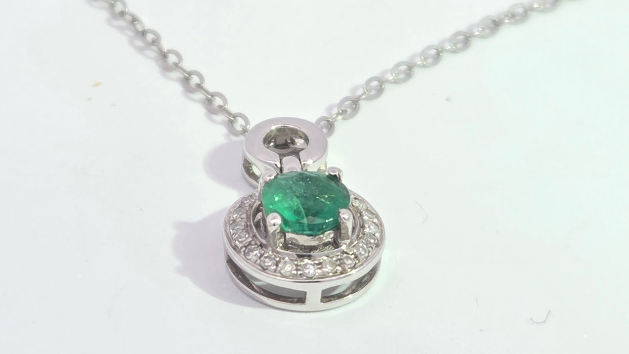 Vintage: 18ct White Gold Emerald 0.55ct & Diamond 0.06ct Halo Pendant and Chain