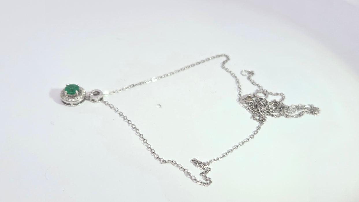 Vintage: 18ct White Gold Emerald 0.55ct & Diamond 0.06ct Halo Pendant and Chain