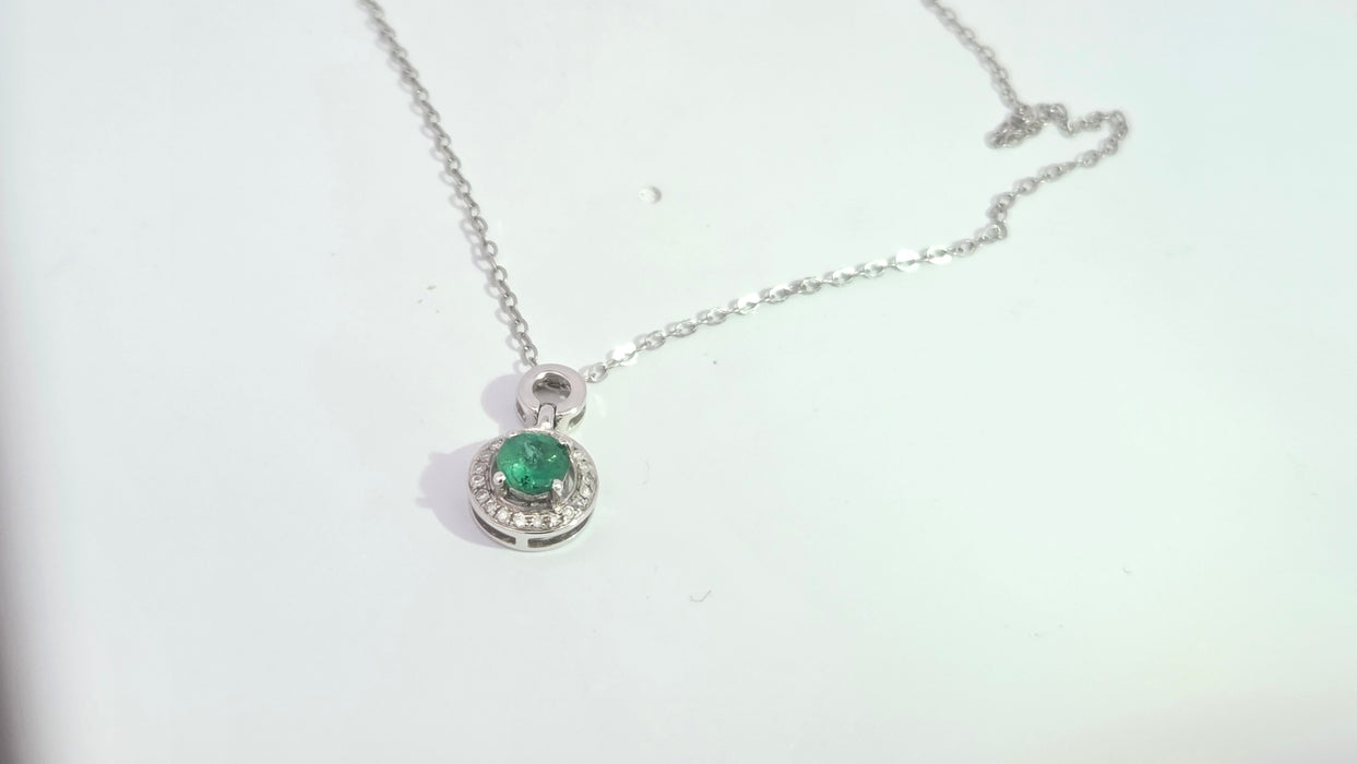 Vintage: 18ct White Gold Emerald 0.55ct & Diamond 0.06ct Halo Pendant and Chain