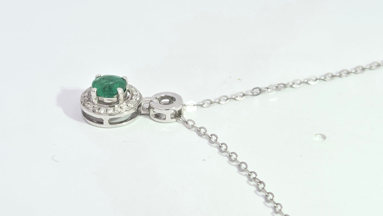 Vintage: 18ct White Gold Emerald 0.55ct & Diamond 0.06ct Halo Pendant and Chain