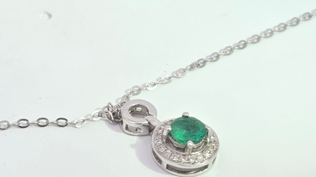 Vintage: 18ct White Gold Emerald 0.55ct & Diamond 0.06ct Halo Pendant and Chain